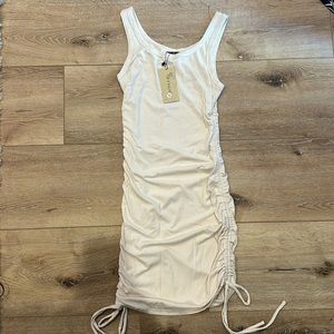 VTSGN Dress with ruched sides. Size small